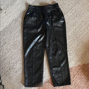 Paris-inspired winter staple: black straight-leg, faux leather pants